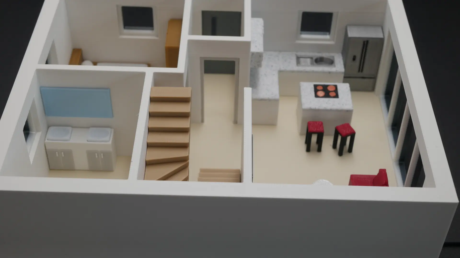 Gesamte Wohnebene im 3D-Modell mit Bett, K&uuml;che, Kochinsel und Sofa