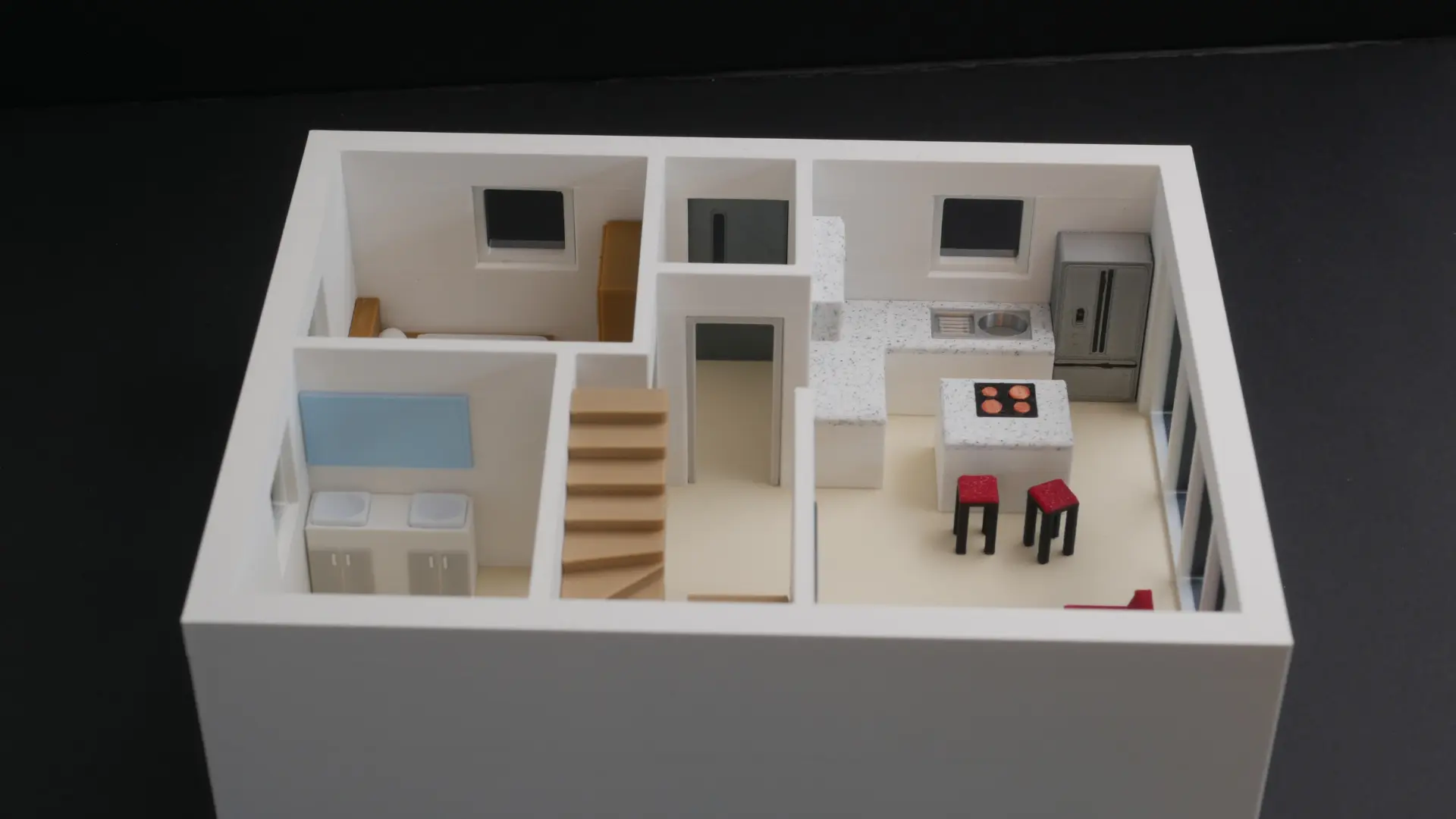 Schlafzimmer und offene Kueche im 3D-Grundrissmodell